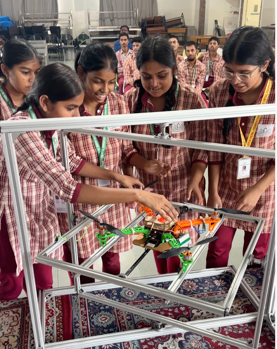 Students playing with drone